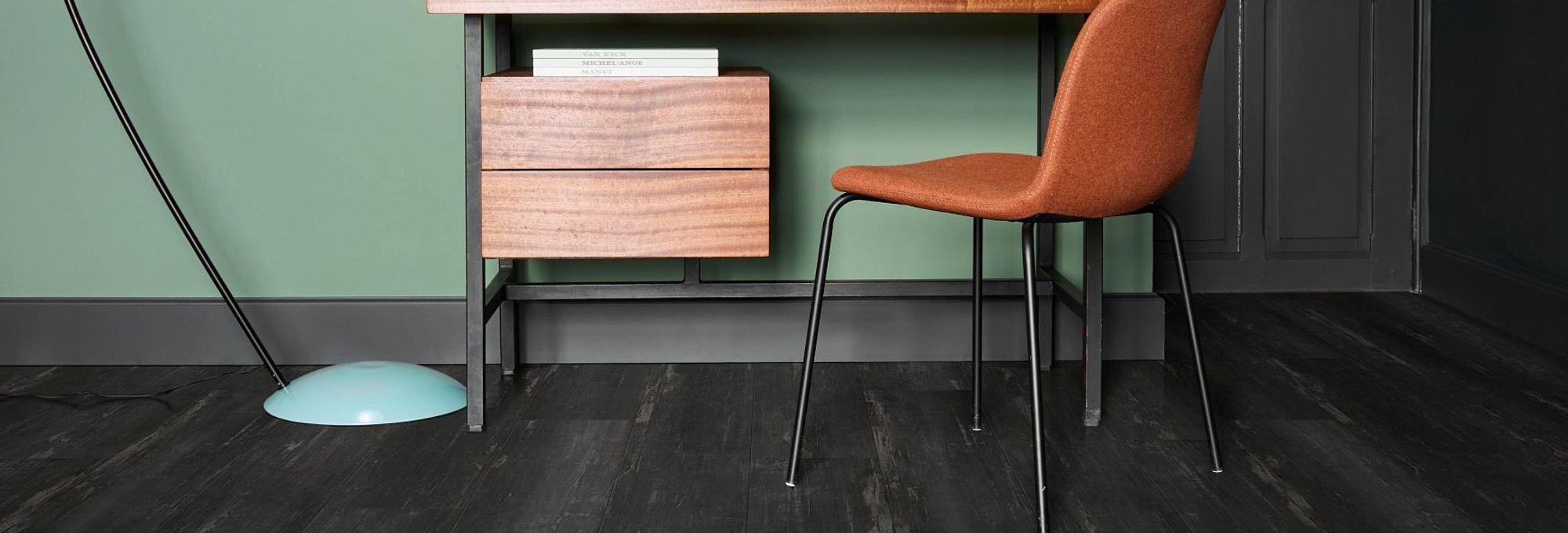 Home office with dark wood-look luxury vinyl flooring from B & B Floor Co in Springfield, VA